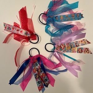 Lot of 4 character ribbon hair ties